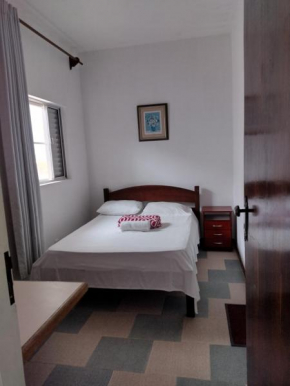 Quarto Casal com banheiro em casa de Praia em Guarujá SP